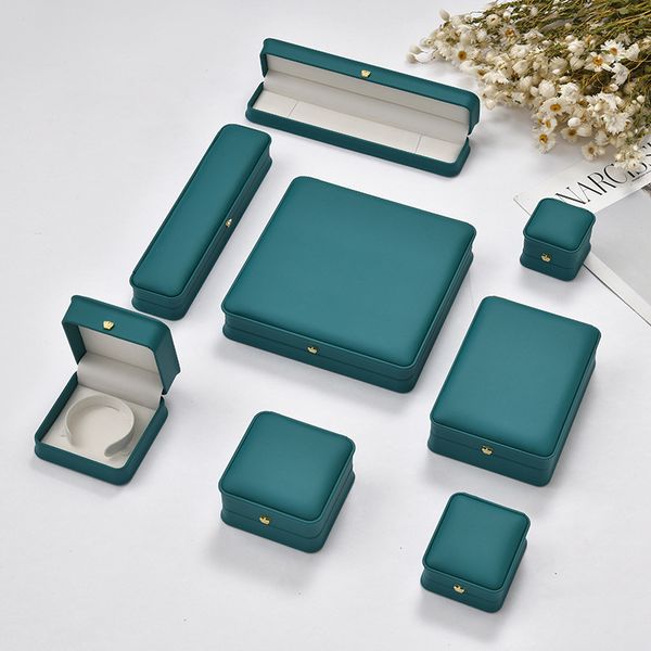 wholesale high-end pu leather jewelry ring pendant bracelet box golden round corner crown decoration box dark green jewelry box, Black;white
wholesale high-end pu leather jewelry ring pendant bracelet box golden round corner crown decoration box dark green jewelry box, Black;white