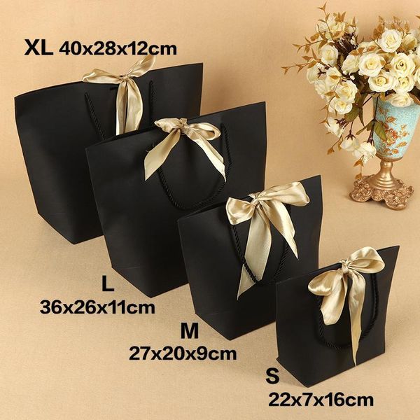 5pcs large size present box for clothes books packaging gold handle paper box bags kraft paper gift bag with handles & ribbons1
5pcs large size present box for clothes books packaging gold handle paper box bags kraft paper gift bag with handles & ribbons1