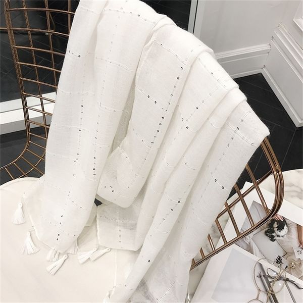 new white sequin tassel pure cotton hemp art spring summer autumn shawl women's headscarf silk scarf y201007, Blue;gray
new white sequin tassel pure cotton hemp art spring summer autumn shawl women's headscarf silk scarf y201007, Blue;gray