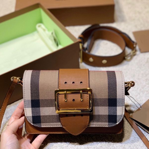 british house plaid color matching flap buckle wide strap single shoulder messenger small square leather women's bag
british house plaid color matching flap buckle wide strap single shoulder messenger small square leather women's bag