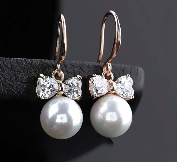 mechosen elegant pearl zircon bow shape pendant earrings gold jewelry for party wedding festival women ear accessories gift 2020, Silver
mechosen elegant pearl zircon bow shape pendant earrings gold jewelry for party wedding festival women ear accessories gift 2020, Silver