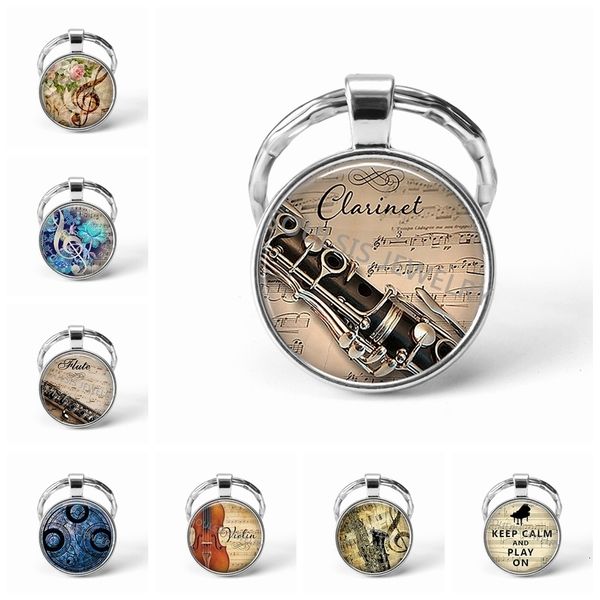 musical instrument clarinet guitar flute violin music key chain pendant music note keychain key rings music glass dome jewelry, Slivery;golden
musical instrument clarinet guitar flute violin music key chain pendant music note keychain key rings music glass dome jewelry, Slivery;golden
