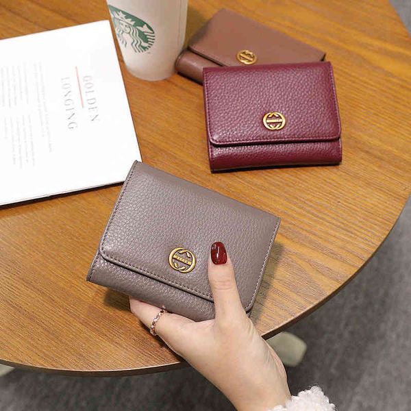 new wallet women's short leather folding fashion simple three fold multifunctional clip buckle, Red;black
new wallet women's short leather folding fashion simple three fold multifunctional clip buckle, Red;black