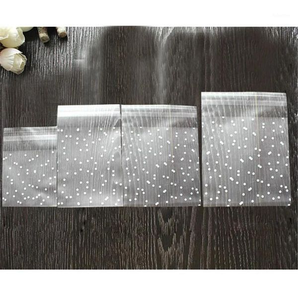 100pcs/set gift packing bag plastic biscuits packaging bread baking supplies white dot candy cookies package party wedding decor1
100pcs/set gift packing bag plastic biscuits packaging bread baking supplies white dot candy cookies package party wedding decor1