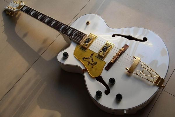 lefty white falcon hollow body, white color 6 strings electric guitar, gold hardware, ing
lefty white falcon hollow body, white color 6 strings electric guitar, gold hardware, ing