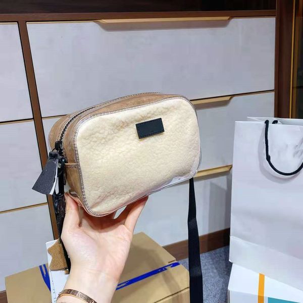 autumn and winter new lamb fur integrated camera bag saddle bag transparent jelly bag. size: 21cm * 13cm
autumn and winter new lamb fur integrated camera bag saddle bag transparent jelly bag. size: 21cm * 13cm