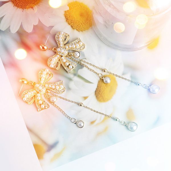 diamond bow exaggerated 925 silver pin earrings pearl tassel women's earrings long elegant fashion temperament, Golden;silver
diamond bow exaggerated 925 silver pin earrings pearl tassel women's earrings long elegant fashion temperament, Golden;silver