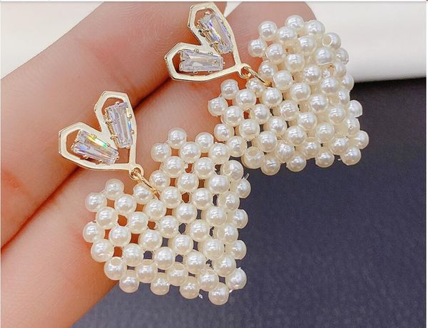2020 sweet and large pearl heart-shaped earrings with manga lines for the new japanese and korean style 374, Golden;silver
2020 sweet and large pearl heart-shaped earrings with manga lines for the new japanese and korean style 374, Golden;silver