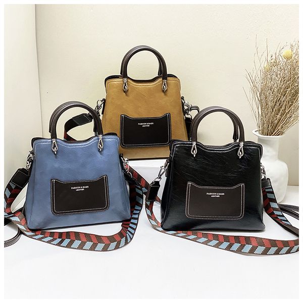 bucket women's 2020 new high capacity color contrast handbag with wide strap and single shoulder messenger bag
bucket women's 2020 new high capacity color contrast handbag with wide strap and single shoulder messenger bag