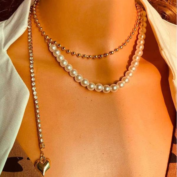 creative design heart pendant necklace for women rhinestone imitation pearl layered choker necklace jewelry 2021 fashion trend, Golden;silver
creative design heart pendant necklace for women rhinestone imitation pearl layered choker necklace jewelry 2021 fashion trend, Golden;silver