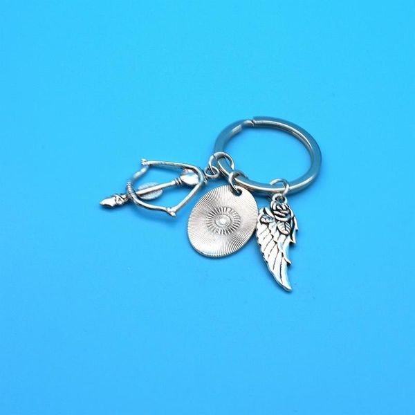 new fashion keychainthe walking dead pendants diy men jewelry car key chain ring holder souvenir for gift wing and bow wmtpud
new fashion keychainthe walking dead pendants diy men jewelry car key chain ring holder souvenir for gift wing and bow wmtpud