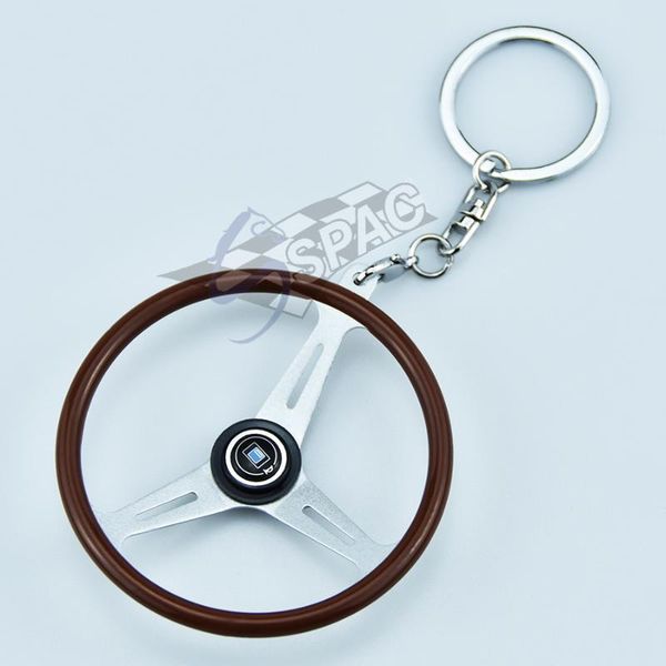 1pcs auto key ring with logo mini racing car steering wheel shape key chain ring for car fans and lovers, Silver
1pcs auto key ring with logo mini racing car steering wheel shape key chain ring for car fans and lovers, Silver