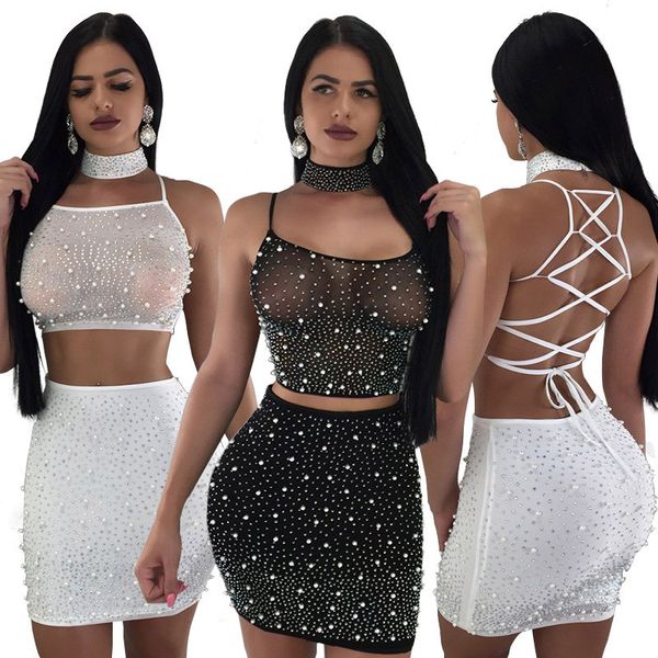 2021 summer women suit style model solid-color spaghetti strap hollow out beads crop & skirt 2 piece set with a choker, Gray
2021 summer women suit style model solid-color spaghetti strap hollow out beads crop & skirt 2 piece set with a choker, Gray