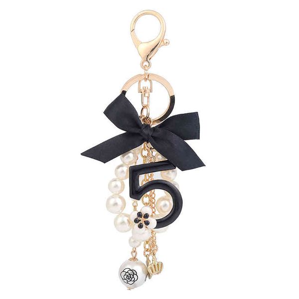 trendy key number 5 pendant for woman luxury jewelry bow car keyring bowknot camellia pearl keychains bag decoration, Slivery;golden
trendy key number 5 pendant for woman luxury jewelry bow car keyring bowknot camellia pearl keychains bag decoration, Slivery;golden
