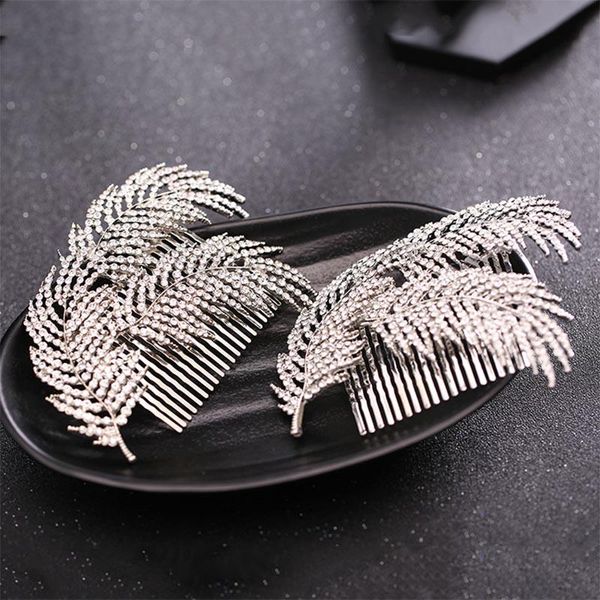new european bride hair ornaments exquisite white rhinestone leaves hair comb for girl women wedding elegant jewelry headwear, Golden;silver
new european bride hair ornaments exquisite white rhinestone leaves hair comb for girl women wedding elegant jewelry headwear, Golden;silver