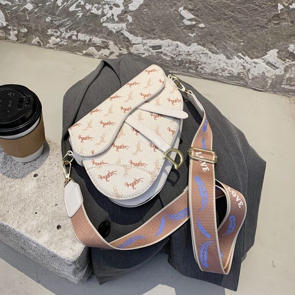 autumn women's small popular new versatile broadband messenger fashion one shoulder saddle bag
autumn women's small popular new versatile broadband messenger fashion one shoulder saddle bag