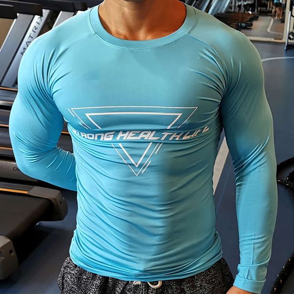fitness long sleeve quick drying muscle men's tights running sportswear iron training clothes elastic t-shirt backing, Gray
fitness long sleeve quick drying muscle men's tights running sportswear iron training clothes elastic t-shirt backing, Gray