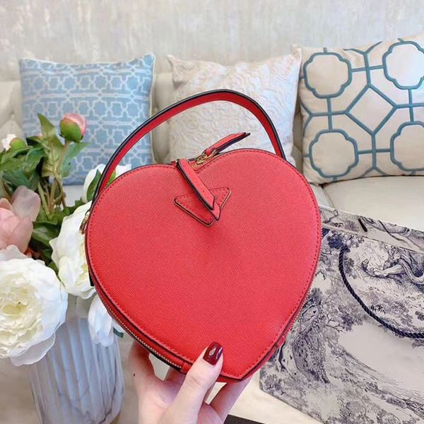 2020 сумка для женского креста body body в форме сердца сумка сумка crossbody кошельки сумки подлинная кожаная сумка высококачественные сумк
2020 сумка для женского креста body body в форме сердца сумка сумка crossbody кошельки сумки подлинная кожаная сумка высококачественные сумк