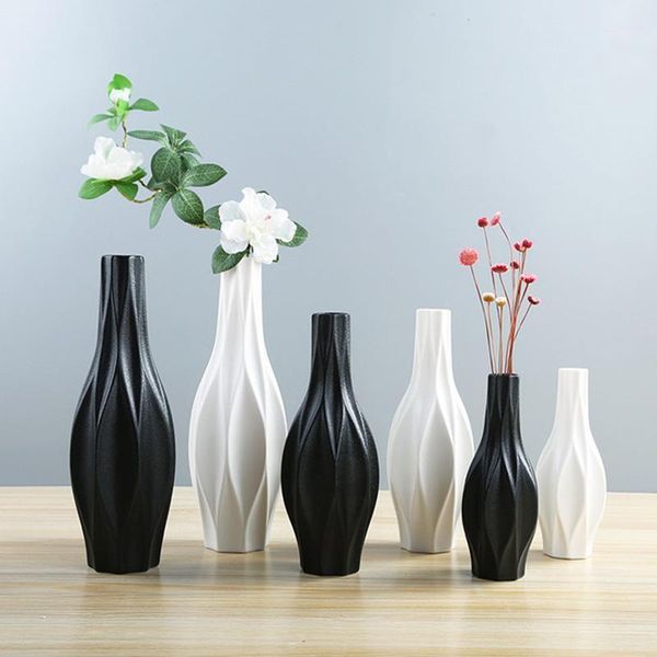modern simple white/black ceramic dried flower vase creative tableplant flowerpot home decor european style decorative vases1
modern simple white/black ceramic dried flower vase creative tableplant flowerpot home decor european style decorative vases1