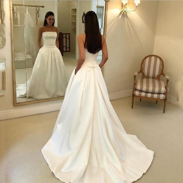 custom made straplsess satin a line wedding dresses with pockets bow court train ruffle backless bridal gowns, White
custom made straplsess satin a line wedding dresses with pockets bow court train ruffle backless bridal gowns, White