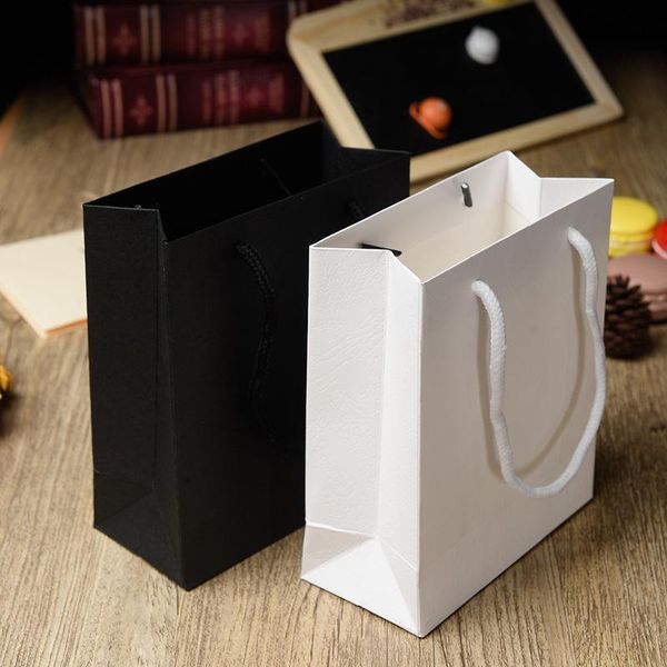 gift wrap simple paper bag kraft candy box with handle wedding birthday party package
gift wrap simple paper bag kraft candy box with handle wedding birthday party package