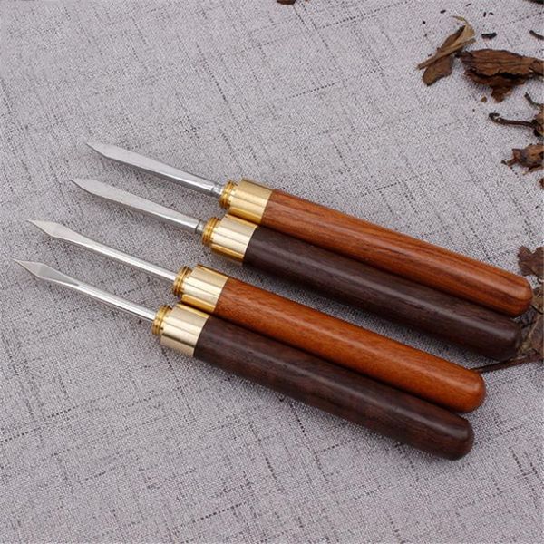 2020 new puer tea knife needle pick with wood handle puer tea tools cone needle breaking prying tea brick professional tool 143 n2
2020 new puer tea knife needle pick with wood handle puer tea tools cone needle breaking prying tea brick professional tool 143 n2