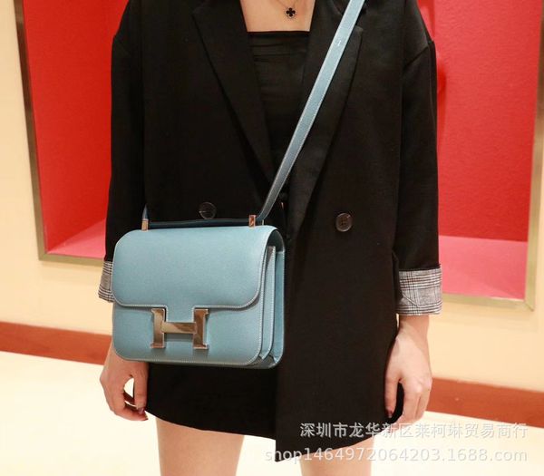 kangkang stewardess h button small square women's leather tofu new single shoulder messenger bag
kangkang stewardess h button small square women's leather tofu new single shoulder messenger bag