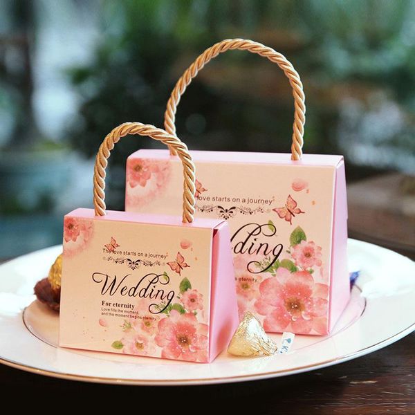 50pcs butterfly flower candy kraft paper bag with handle wedding favor portable box wedding party gift favors
50pcs butterfly flower candy kraft paper bag with handle wedding favor portable box wedding party gift favors