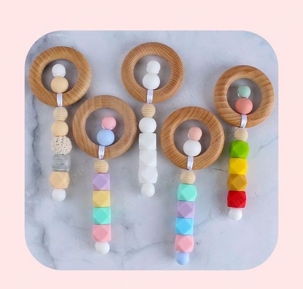 2021 new diy silicone baby teethers wooden teething training kids teether teething ring handmade natural infant wood ring teethers
2021 new diy silicone baby teethers wooden teething training kids teether teething ring handmade natural infant wood ring teethers