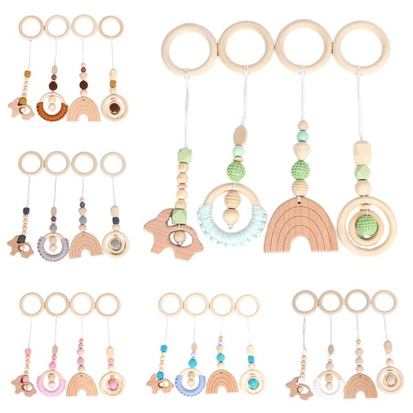4 pcs/set baby teething nursing rattle toys gifts play gym frame stroller hanging pendants wooden ring teether molar q1214
4 pcs/set baby teething nursing rattle toys gifts play gym frame stroller hanging pendants wooden ring teether molar q1214