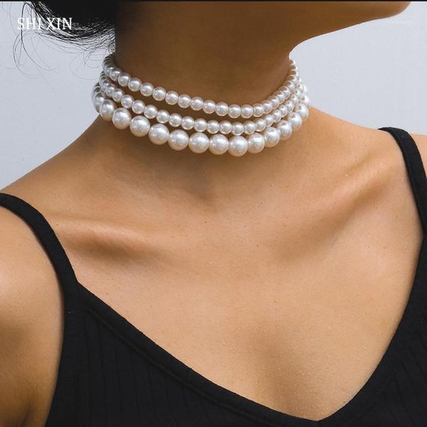 shixin 3 pcs/set layered pearl necklace 2020 fashion short white beads choker collar necklaces jewelry on the neck collier femme1, Golden;silver
shixin 3 pcs/set layered pearl necklace 2020 fashion short white beads choker collar necklaces jewelry on the neck collier femme1, Golden;silver