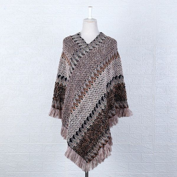 autumn and winter national style cape cape cape t-shirt tassel scarf coat women's long blanket for warmth
autumn and winter national style cape cape cape t-shirt tassel scarf coat women's long blanket for warmth