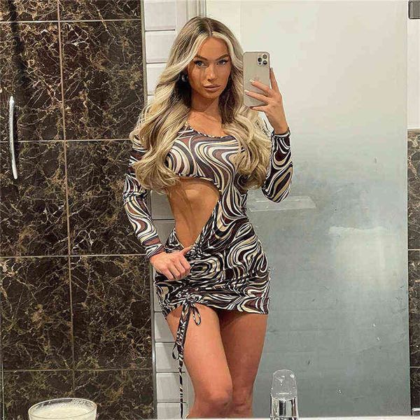 woman's dress wind 2022 winter women's fashion round neck long sleeve hollow print slim wrap hip dress, Black;gray 
woman's dress wind 2022 winter women's fashion round neck long sleeve hollow print slim wrap hip dress, Black;gray