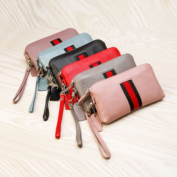 luxurys designers new high capacity head layer leather hand women's mobile phone bag fashion korean version
luxurys designers new high capacity head layer leather hand women's mobile phone bag fashion korean version