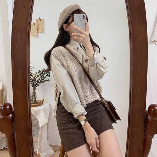 side cut new loose sleeveless sweater spring autumn women's v neck joker vintage knitted wool vest 201214, Black;white
side cut new loose sleeveless sweater spring autumn women's v neck joker vintage knitted wool vest 201214, Black;white