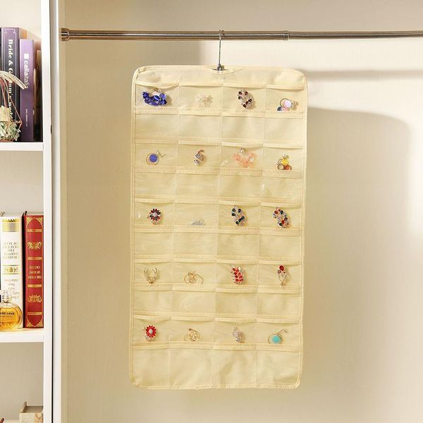 storage boxes & bins 40 pockets hanging jewelry bag for girl/women small objects finishing dustproof organizers
storage boxes & bins 40 pockets hanging jewelry bag for girl/women small objects finishing dustproof organizers
