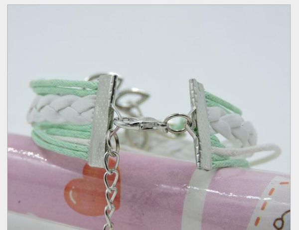 owls lucky branch/leaf lovely bird charm infinity, bracelet in silver - mint green wax cords and leather braidps1486
owls lucky branch/leaf lovely bird charm infinity, bracelet in silver - mint green wax cords and leather braidps1486