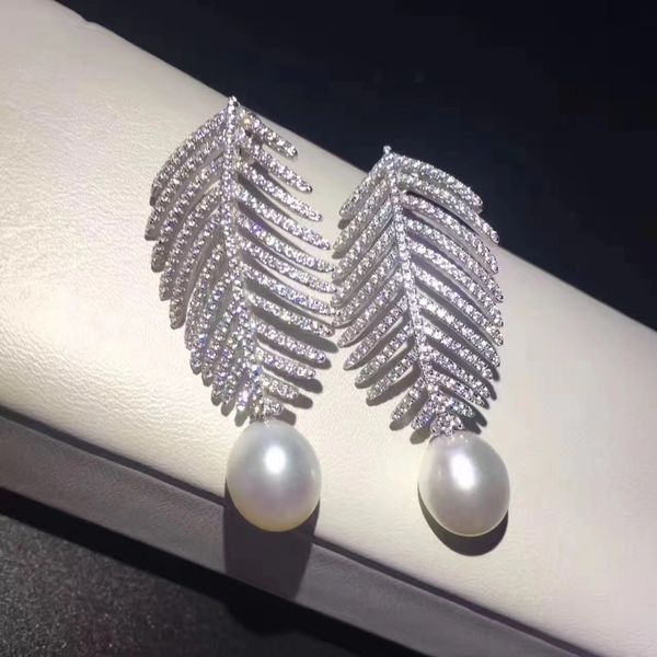 wholesale 925 sterling silver with cubic zircon leaf feather stud earring fashion women jewelry fresh water pearl earring, Golden;silver
wholesale 925 sterling silver with cubic zircon leaf feather stud earring fashion women jewelry fresh water pearl earring, Golden;silver
