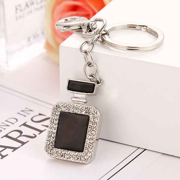 2020 z fashion explosion black painting oil rhinestone perfume bottle bag key chain birthday party gift, Silver
2020 z fashion explosion black painting oil rhinestone perfume bottle bag key chain birthday party gift, Silver