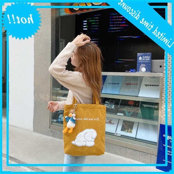 09131 japanese hansen corduroy cute embroidered shoulder college style hand-held shopping bag female
09131 japanese hansen corduroy cute embroidered shoulder college style hand-held shopping bag female