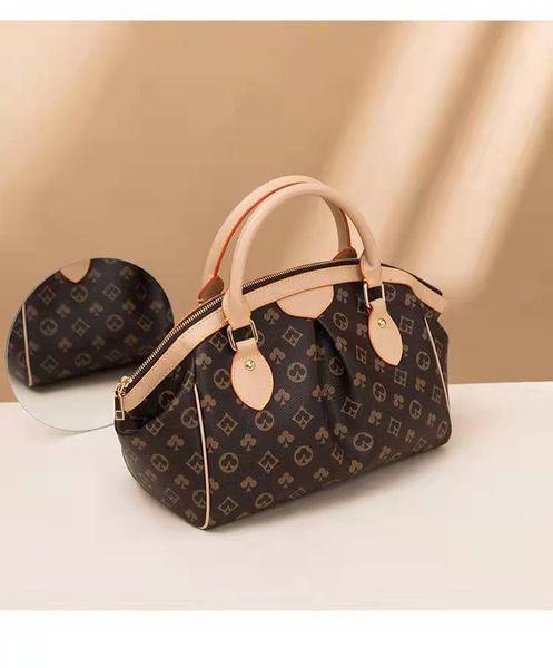 brand shell bag ladies new european and american retro simple classic hand-held slant dumpling bag temperament handbag quality
brand shell bag ladies new european and american retro simple classic hand-held slant dumpling bag temperament handbag quality