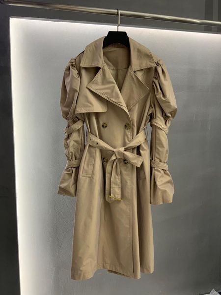 2021 new ladies fashion long sleeve lapel solid color puff sleeve lace-up trench coat 0915, Black;brown
2021 new ladies fashion long sleeve lapel solid color puff sleeve lace-up trench coat 0915, Black;brown