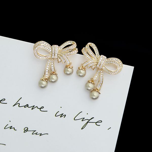 2020 korean trendy luxury pearl bow stud earrings brand s925 silver needle plated 18k gold high-grade zircon earrings jewelry, Golden;silver
2020 korean trendy luxury pearl bow stud earrings brand s925 silver needle plated 18k gold high-grade zircon earrings jewelry, Golden;silver