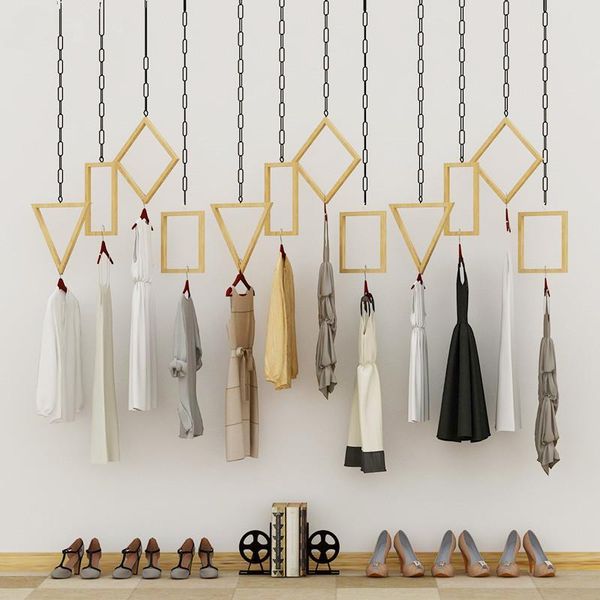 hooks & rails multifunctional hanger hanging on the wall of display rack in clothing store
hooks & rails multifunctional hanger hanging on the wall of display rack in clothing store