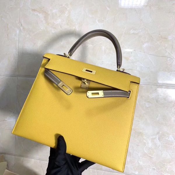 customized brand purse 25cmhalf handmade quality 2tones design bag epsom leather wax thread gold and silver hardware wholesale
customized brand purse 25cmhalf handmade quality 2tones design bag epsom leather wax thread gold and silver hardware wholesale
