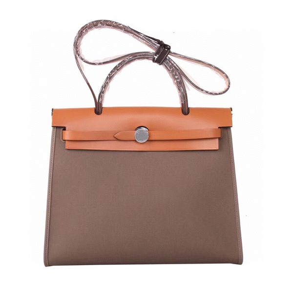 handmade herbag canvas portable shoulder saddle leather briefcase men's and women's commuter bag fashion
handmade herbag canvas portable shoulder saddle leather briefcase men's and women's commuter bag fashion