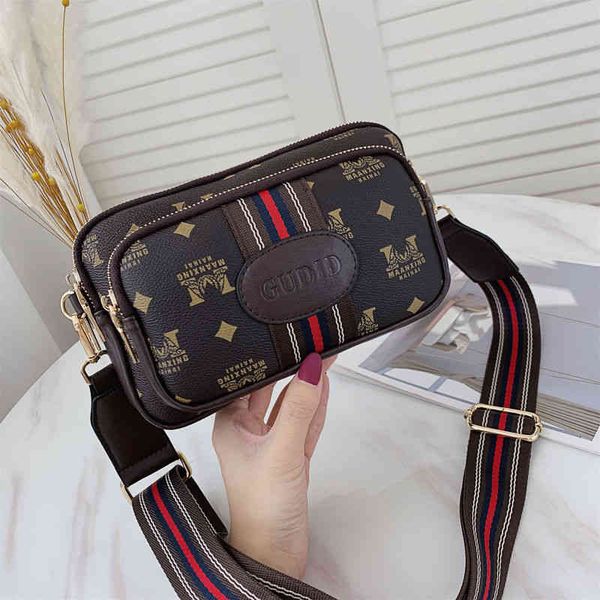 2022 factory wholesale bag women's net red korean cross-linked camera single shoulder small square wide band chest bag
2022 factory wholesale bag women's net red korean cross-linked camera single shoulder small square wide band chest bag