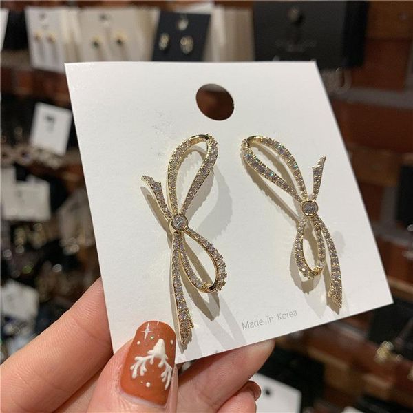 shiny side new design fashion jewelry dongdaemun crystal bow style earrings for women korean version earring, Silver
shiny side new design fashion jewelry dongdaemun crystal bow style earrings for women korean version earring, Silver