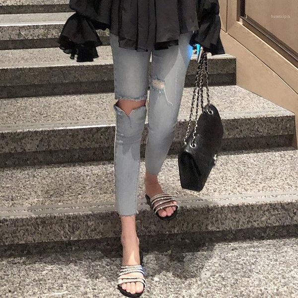 2020 spring light blue skinny jeans hole pants women's thin hong kong flavor 9-point pants peach hips1
2020 spring light blue skinny jeans hole pants women's thin hong kong flavor 9-point pants peach hips1