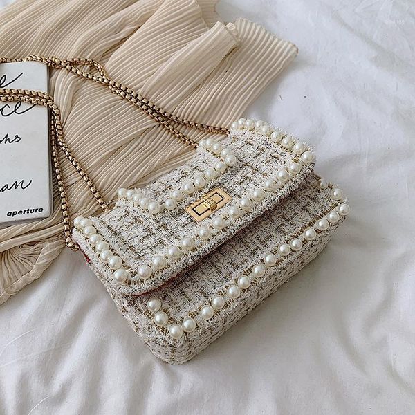 aristocratic lady small fragrant pearl trim weave style fashion sweet temperament bolsa feminina shoulder bag1
aristocratic lady small fragrant pearl trim weave style fashion sweet temperament bolsa feminina shoulder bag1